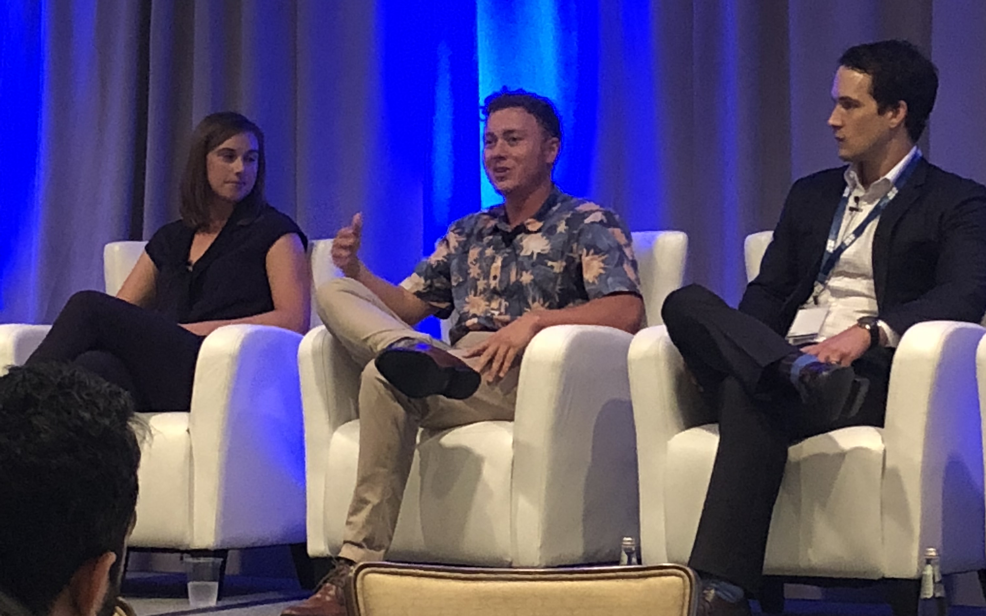 Andy Mewborn speaking on stage